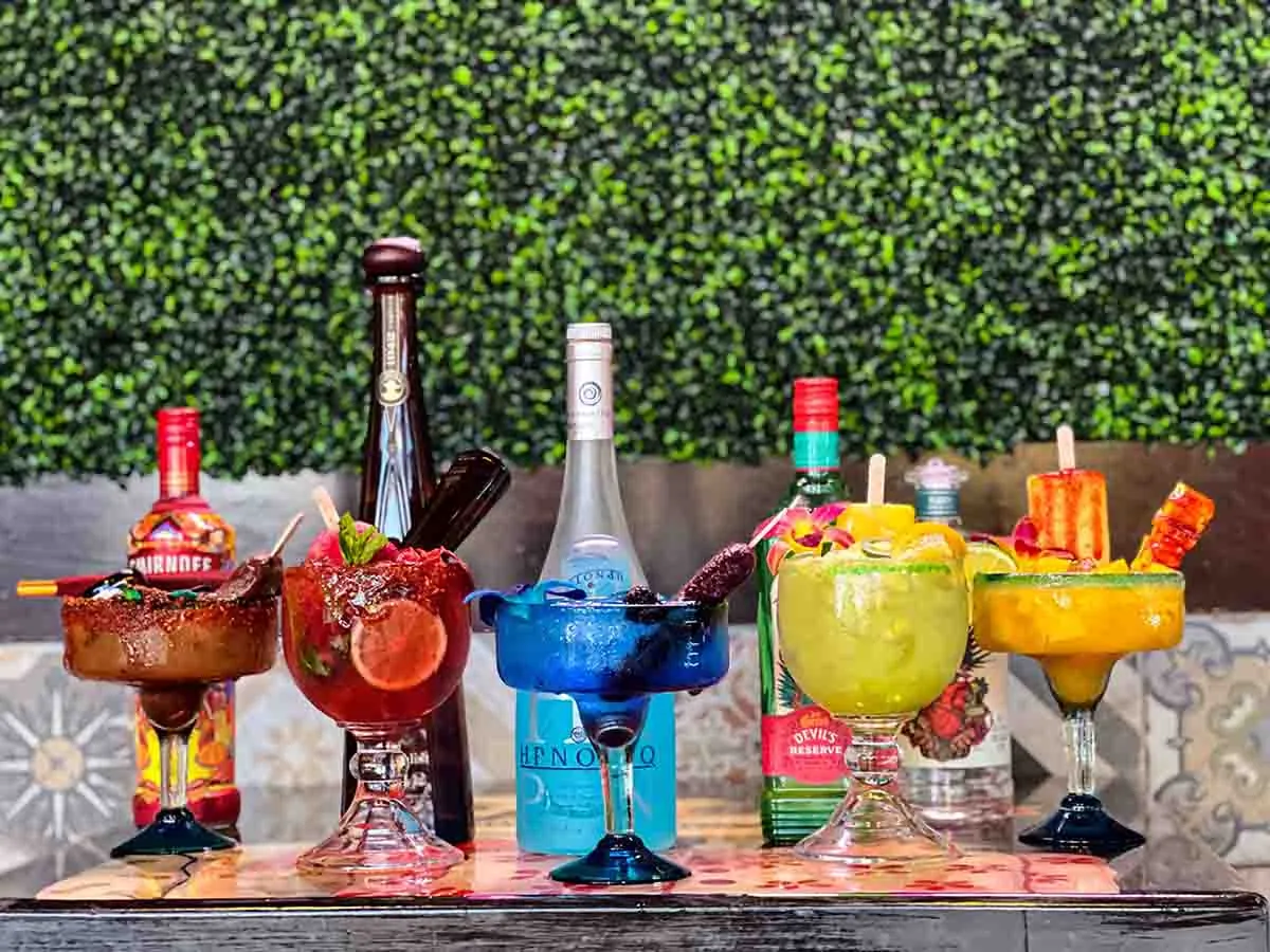 Margaritas lined up on the bar